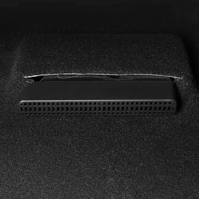 Professional black ABS plastic car trunk vent grille with a perforated design.