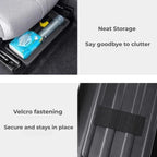 Black car seat storage tray featuring a textured surface and secure Velcro fastening.