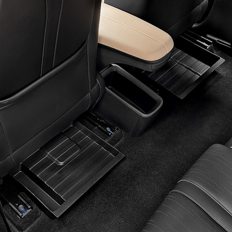 Black heavy-duty waterproof rear seat back protector tray for BYD vehicle interior.
