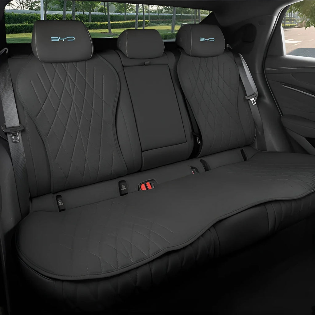 Custom black diamond-stitched faux leather rear seat covers for BYD vehicle interior.