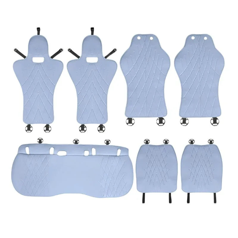Light blue quilted faux leather car floor mat set with diamond stitching.