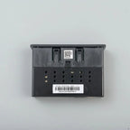 Rear view of a professional black plastic automotive electronics module with white identification labels.