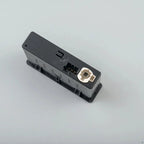 Professional black plastic car accessory connector with a white socket insert.