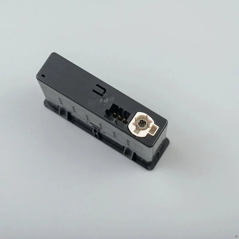 Professional black plastic car accessory connector with a white socket insert.