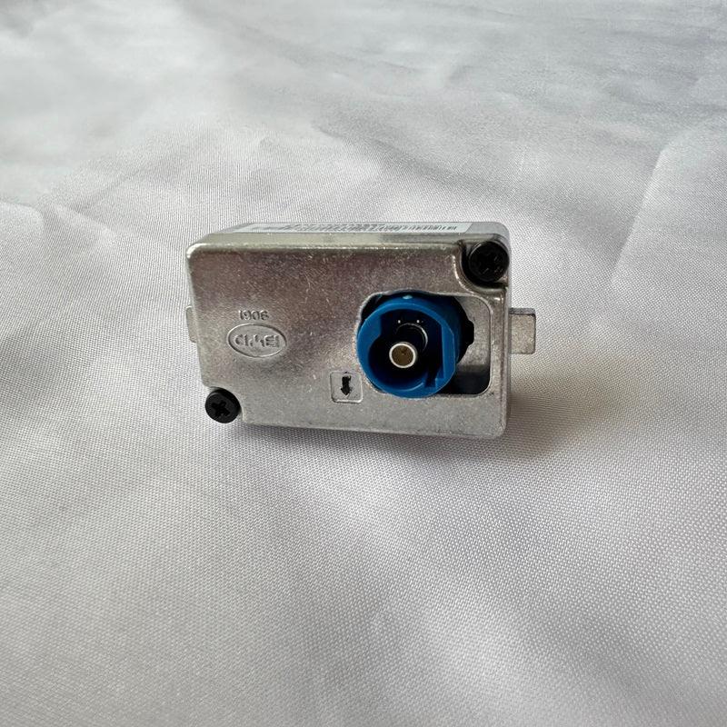 Durable silver metallic automotive component featuring a prominent blue plastic connector port.