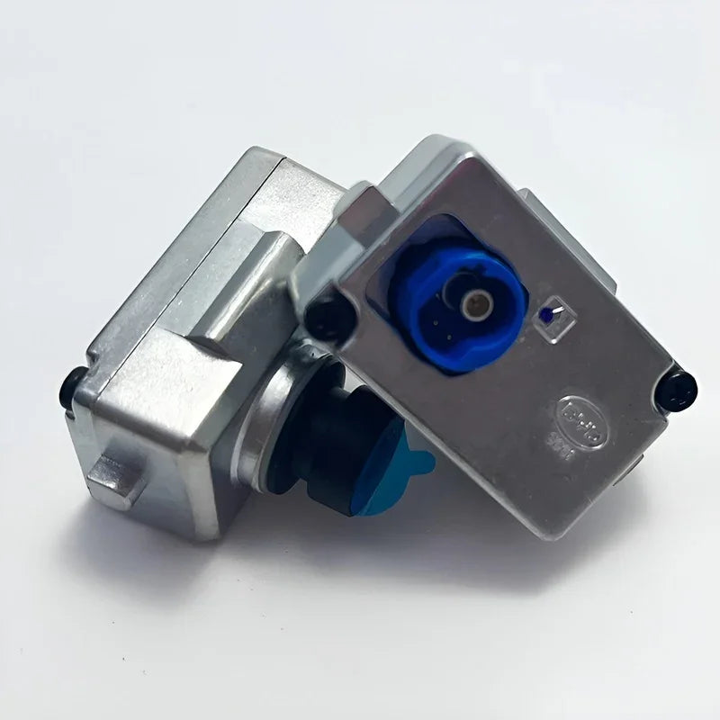 Two silver metal automotive solenoid valves with blue and black plastic components.