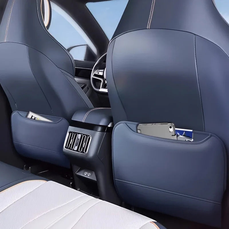 Blue premium leather car seat back organizer pockets with tablet and phone.