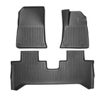 Black heavy-duty rubber car floor mats set with anti-slip ribbed texture for complete protection.