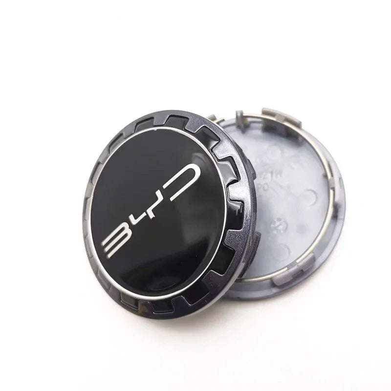 Black and silver metallic BYD wheel center cap accessory with sleek logo design.