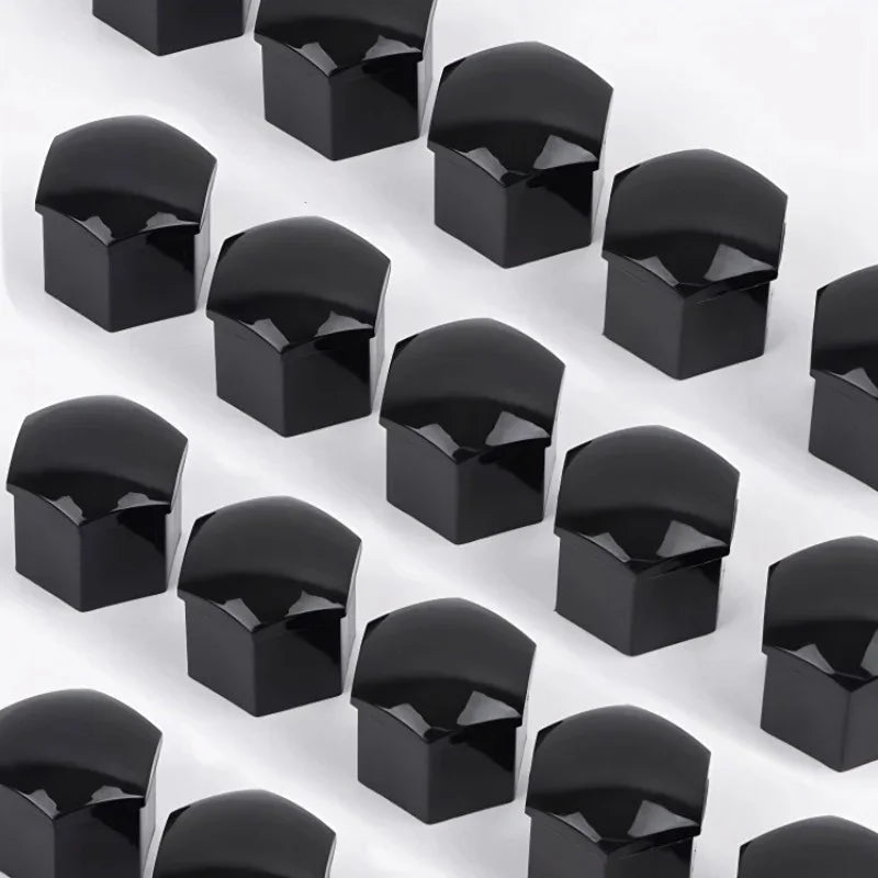 Set of black glossy plastic protective caps for automotive parts