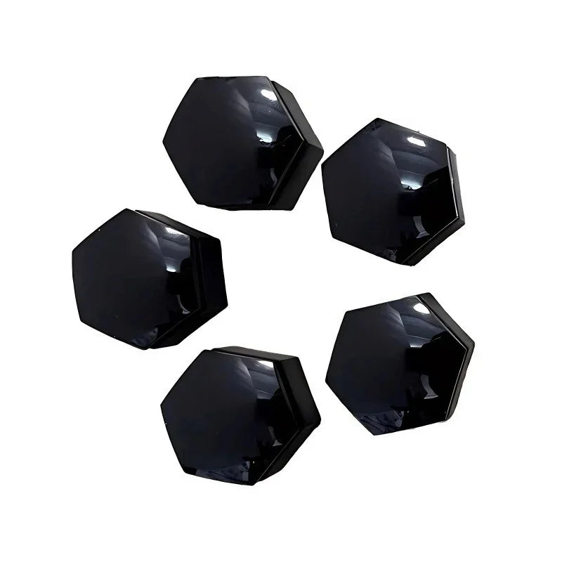 Set of five premium black hexagonal geometric decorative objects with a high-gloss finish.
