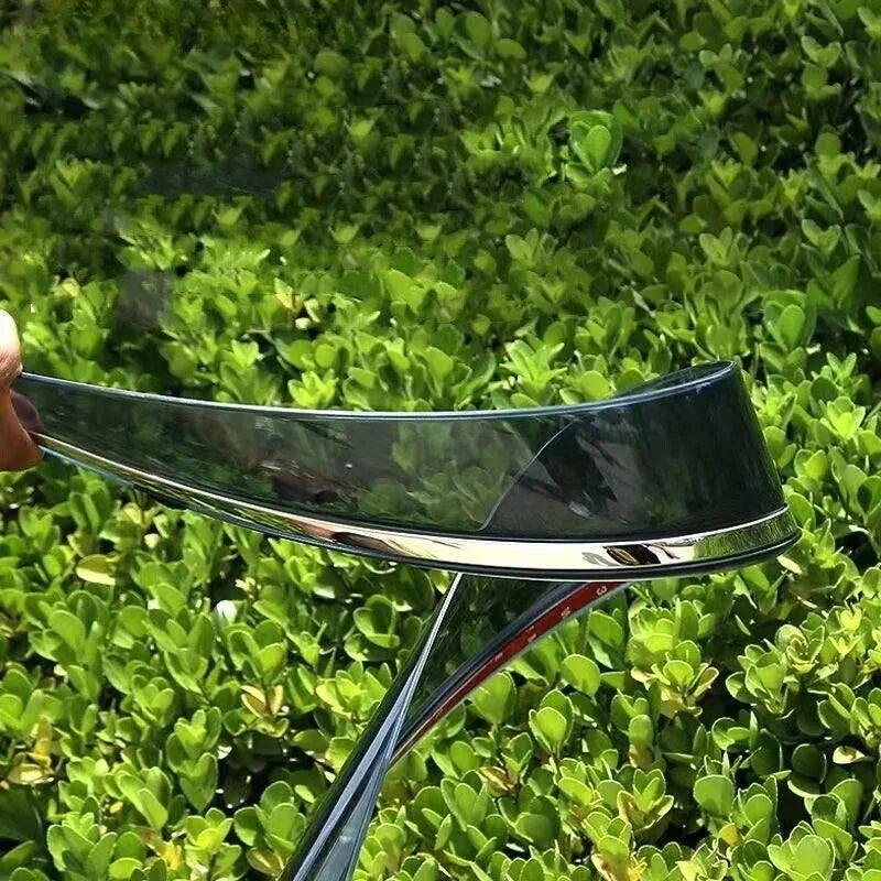 Glossy black chrome trim strip for car exterior decoration, featuring a sleek metallic finish.