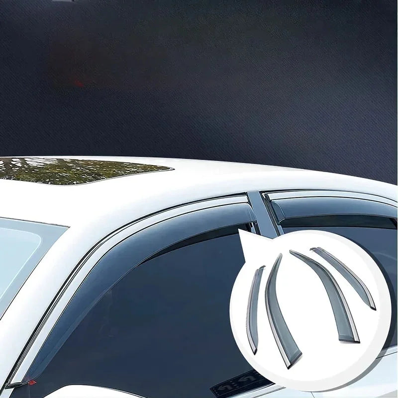 Sleek black tinted acrylic window visors installed on a white car for weather protection.