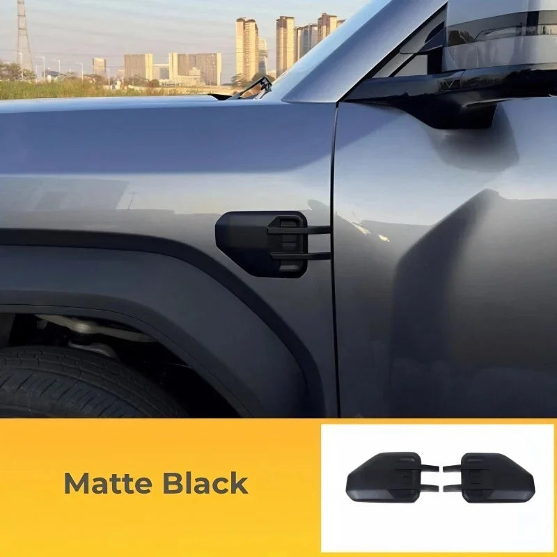 Matte black protective door edge guards for BYD vehicle side panels.
