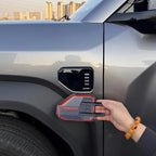 Red-trimmed black carbon fiber style decorative cover for BYD vehicle side vent.