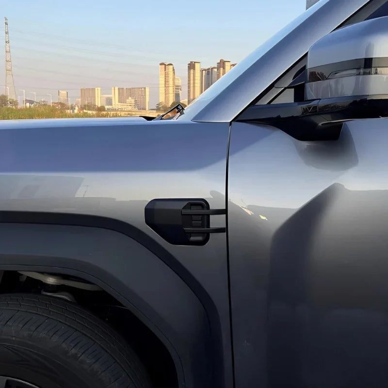 Matte black protective cover for BYD car side mirror hinge, durable high-quality material.
