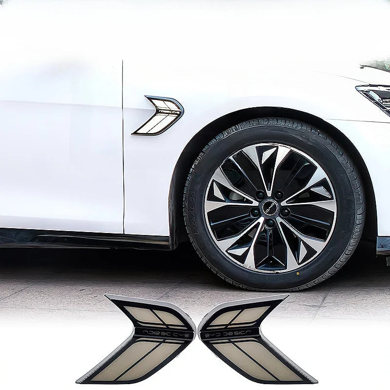 Sleek chrome and black side fender vent accents for white BYD vehicles.