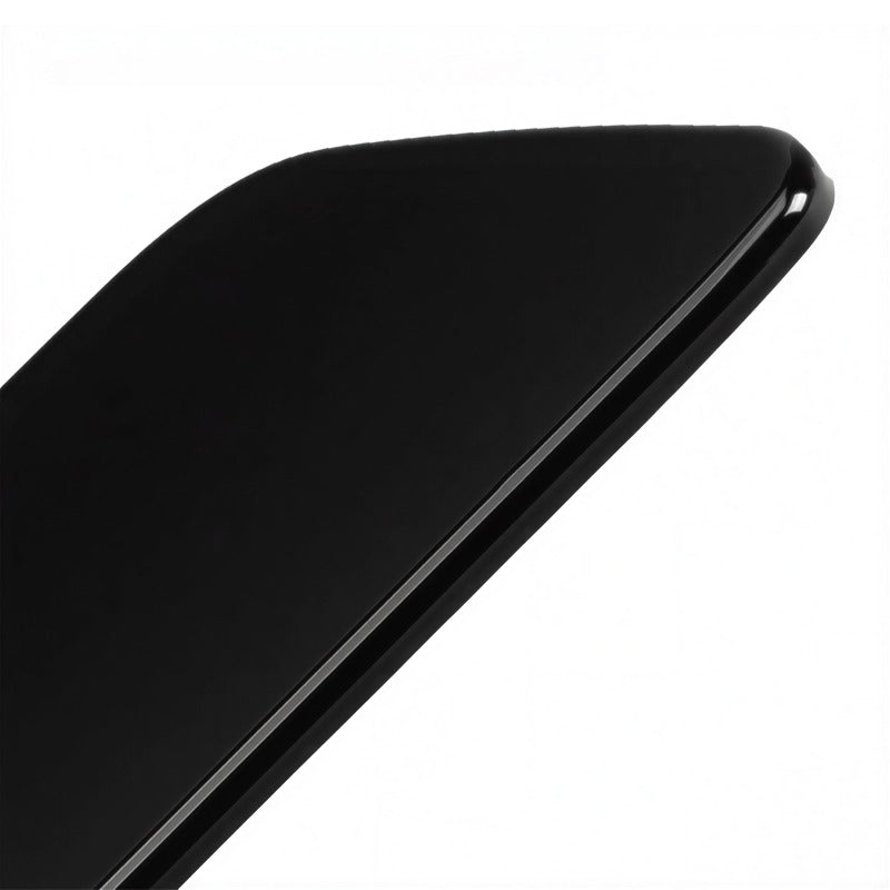 Close-up of a professional gloss black automotive accessory with a smooth, sleek finish.