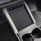 Black textured center console organizer mat with yellow accents for BYD vehicle interior