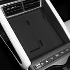 Black textured rubber center console organizer mat for car interior with wireless charging icon.
