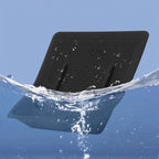 Waterproof black rubber car floor mat with textured anti-slip surface splashing in water