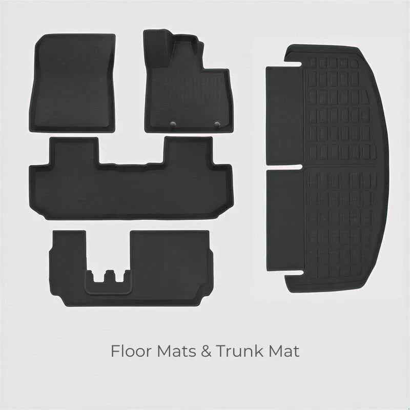 Black heavy-duty rubber floor mats and textured waterproof trunk mat set for car protection.