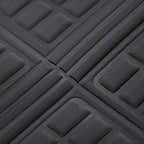 Black textured TPE car floor mat with anti-slip raised patterns for durable protection.