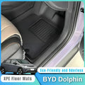 Black eco-friendly XPE floor mats for BYD Dolphin featuring a durable textured surface.