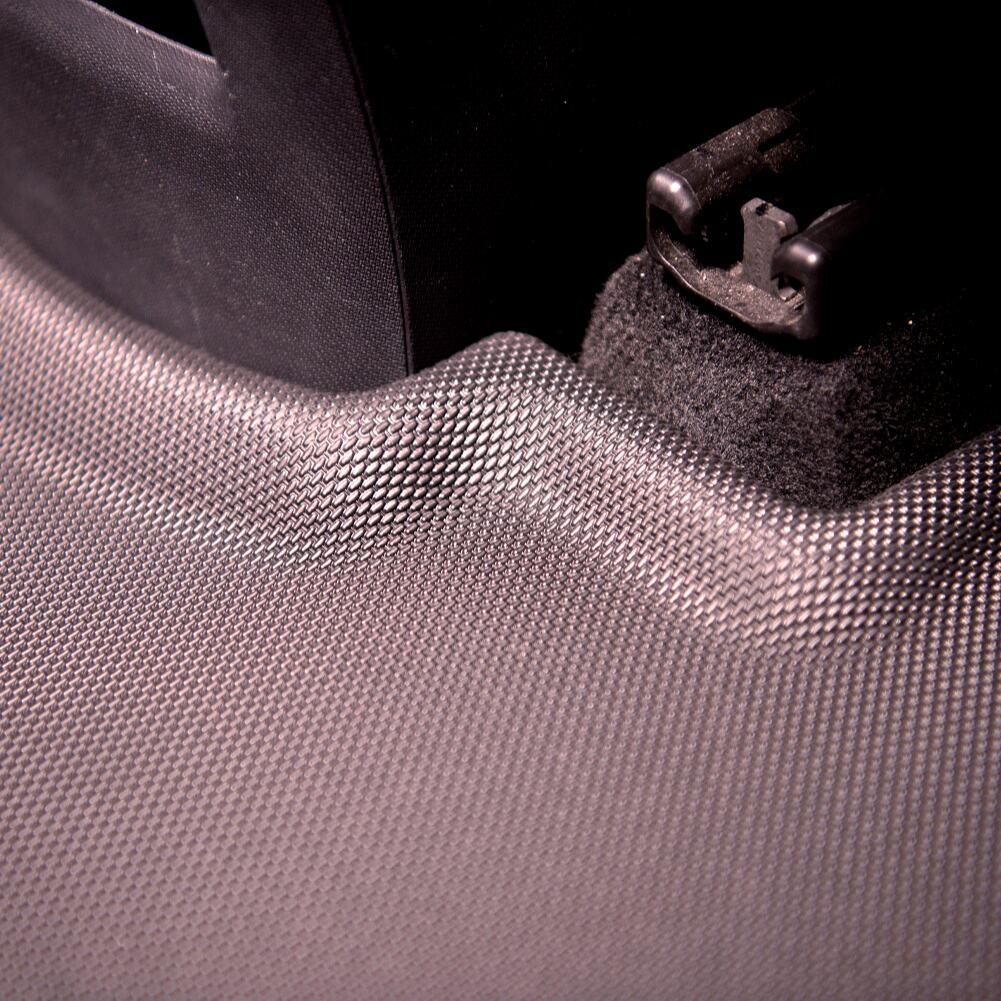 Black textured waterproof car floor mat made of durable synthetic material.