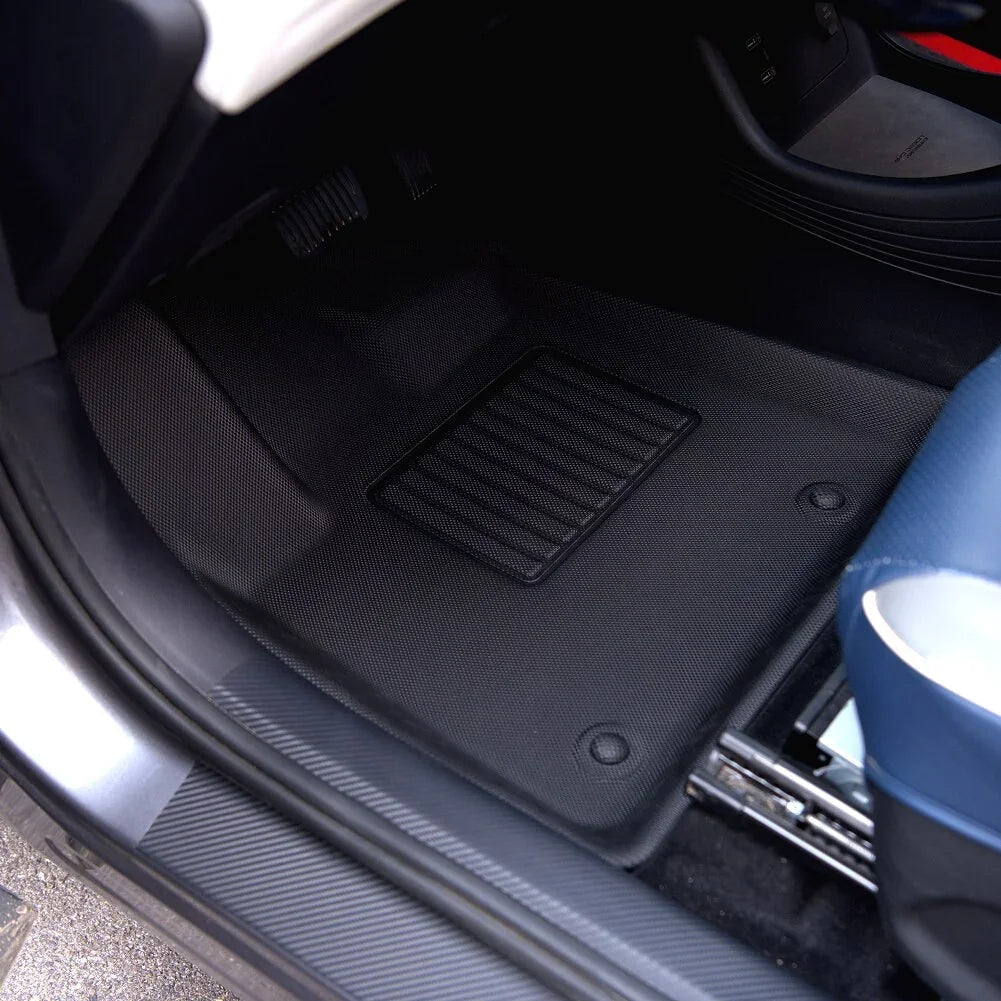 Black textured TPE floor mats for BYD, featuring a durable anti-slip surface and precise fit.