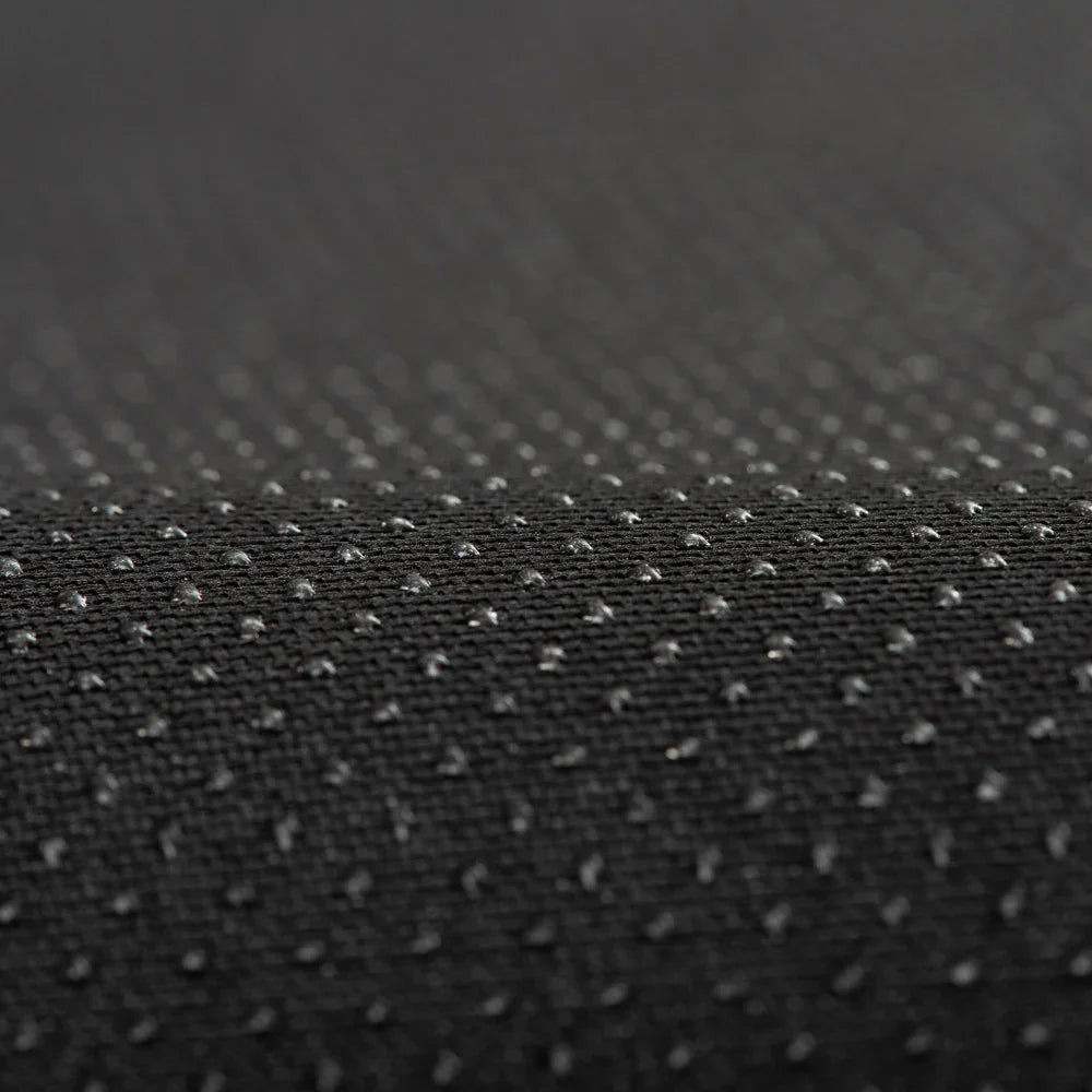 Water-repellent black textured fabric with durable waterproof coating for car accessories.