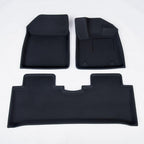 Black custom-fit TPE car floor mats set, durable and waterproof for vehicle protection.