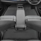 Custom-fit grey TPE car floor mats protecting the interior of a modern vehicle.