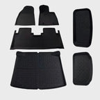 Black heavy-duty waterproof rubber car floor mats set with anti-slip textured surface.