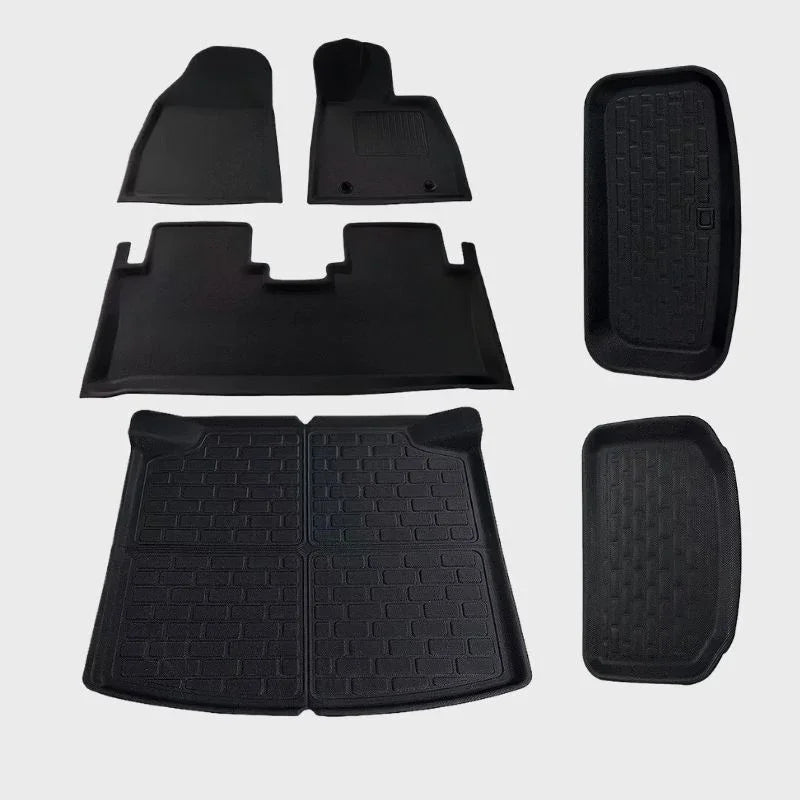 Black heavy-duty waterproof rubber car floor mats set with anti-slip textured surface.