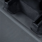 Close-up of a black textured car mat with a durable, water-resistant synthetic material.