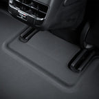 Black textured TPE all-weather floor mat with custom-fit raised edges for vehicle protection.