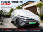 Front view of a waterproof Oxford cloth full car cover for BYD ATTO 2, Yuan Up, and Yuan Pro 2024-2025 with reflective safety strips.