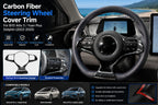 Carbon fiber steering wheel cover trim installed on BYD Atto 3 steering wheel with product view