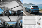 BYD Atto 3 EVO Yuan Plus driving on a coastal road with a panoramic sunroof sun shade installed, reducing heat and glare while enhancing cabin comfort.