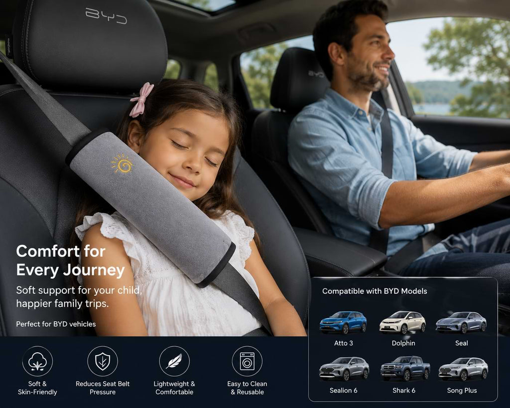 Child sleeping comfortably with BYD seat belt shoulder pad during a family road trip