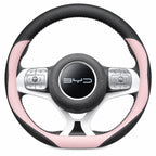 Black leather steering wheel cover installed on a BYD Dolphin with a 38cm Type D steering wheel. pink
