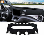 Black RHD dashboard cover installed in a BYD Dolphin interior with custom-fit anti-glare and anti-UV protection for 2021-2024 models.