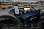 BYD Leopard 8 dashboard phone holder with rear storage box holding a smartphone, sunglasses, and everyday essentials behind the center display.