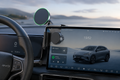 Magnetic wireless phone charger mount installed inside a modern BYD car dashboard with premium interior setup.