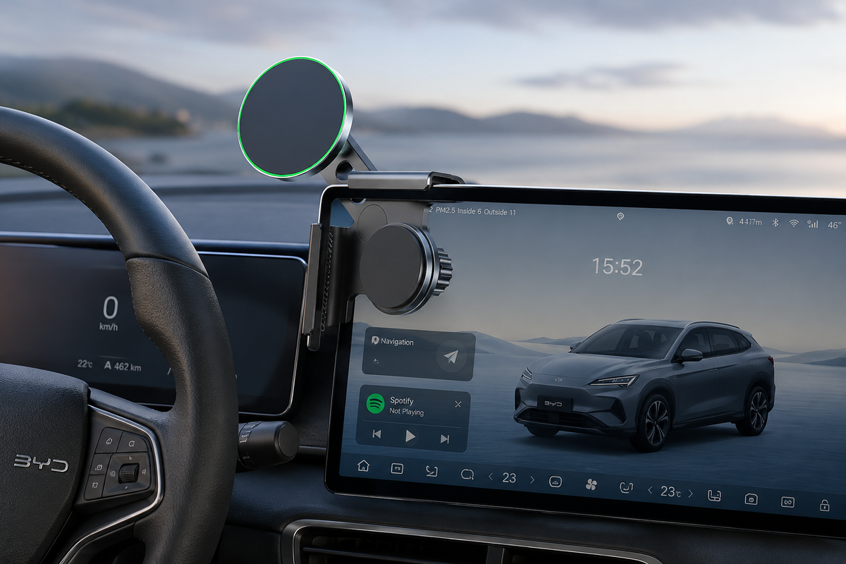 Magnetic wireless phone charger mount installed inside a modern BYD car dashboard with premium interior setup.