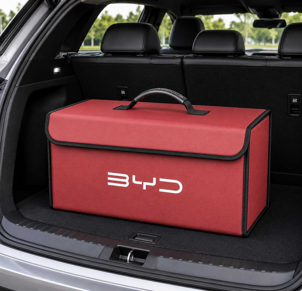 Red BYD foldable trunk storage organizer box placed inside a vehicle cargo area for organized storage and travel essentials