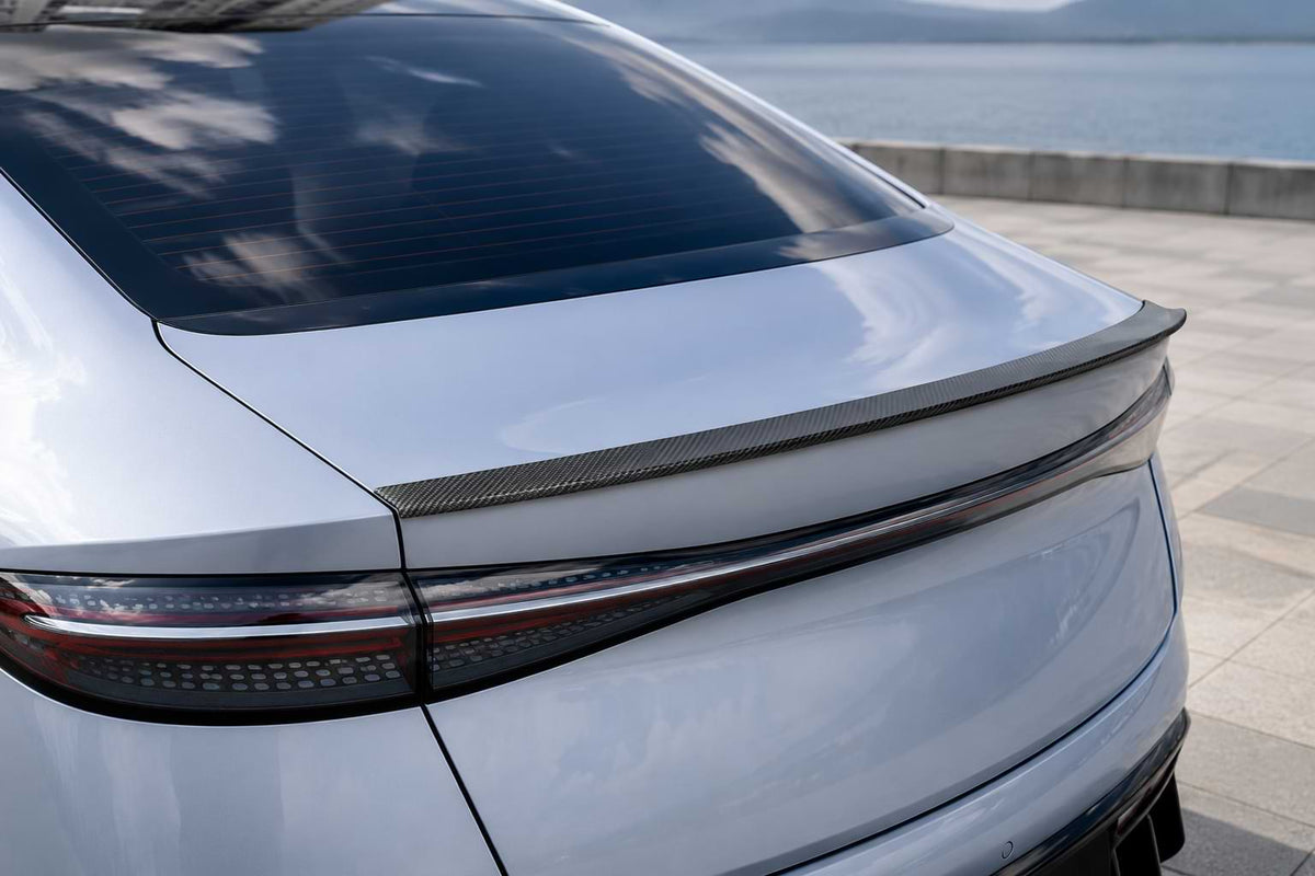carbon black rear trunk spoiler wing for BYD Seal shown from front and rear sides on a white background, compatible with 2022-2024 models.