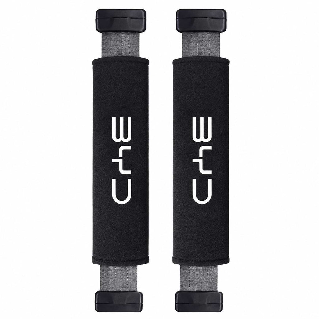 Black BYD car seat belt shoulder cover pads installed on vehicle seat belts for added driving comfort and interior protection.