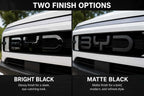 BYD Shark 6 front grille emblem badge sticker comparison in bright black glossy and matte black finish